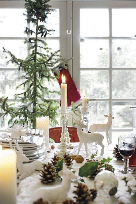 Icy-Christmas-Table-Decor-With-White-Reindeer-And-Candles (1)
