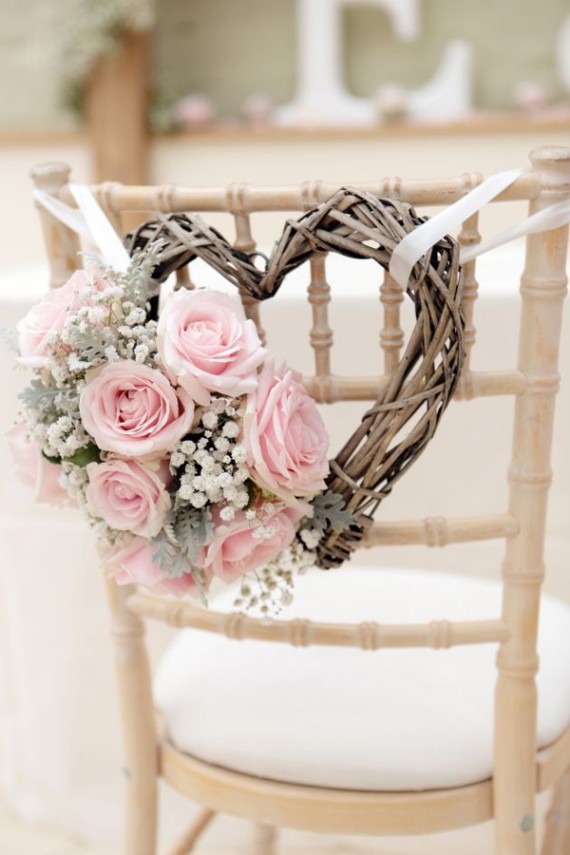 wedding-chair-decorations-with-pink-roses-and-heart-shaped-wreath 