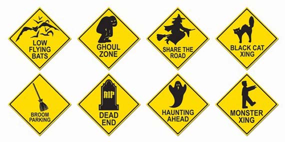 A collection of eight yellow diamond-shaped Halloween caution signs including Ghoul Zone, Haunting Ahead, and Black Cat Xing.