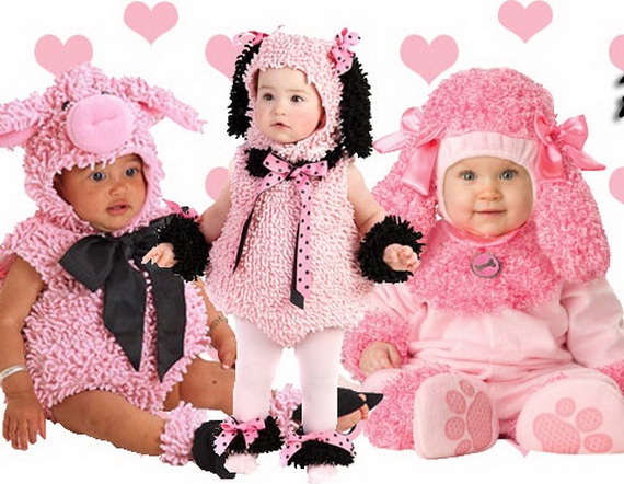 13 Three babies dressed in cozy, plush pink animal costumes—a pig, a puppy, and a poodle—for a baby girl Halloween theme.