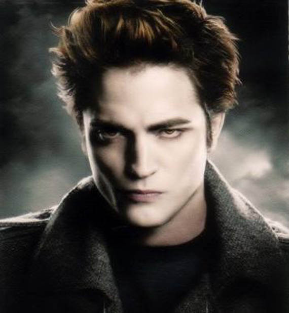 A brooding character with tousled hair and pale skin stares intensely forward against a misty, dark backdrop, exuding a mysterious, intense aura.