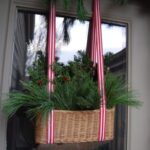 36-a-basket-with-evergreens-and-striped-ribbon