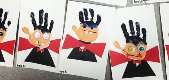 Row of handmade greeting cards featuring characters created from children's handprints, with black hair, colorful eyes, and red bow ties.