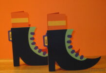 Elegant handmade Halloween Cards Ideas Two handmade Halloween greeting cards shaped like pointed black witch boots with green trim, purple laces, and orange striped socks coming out of the top.