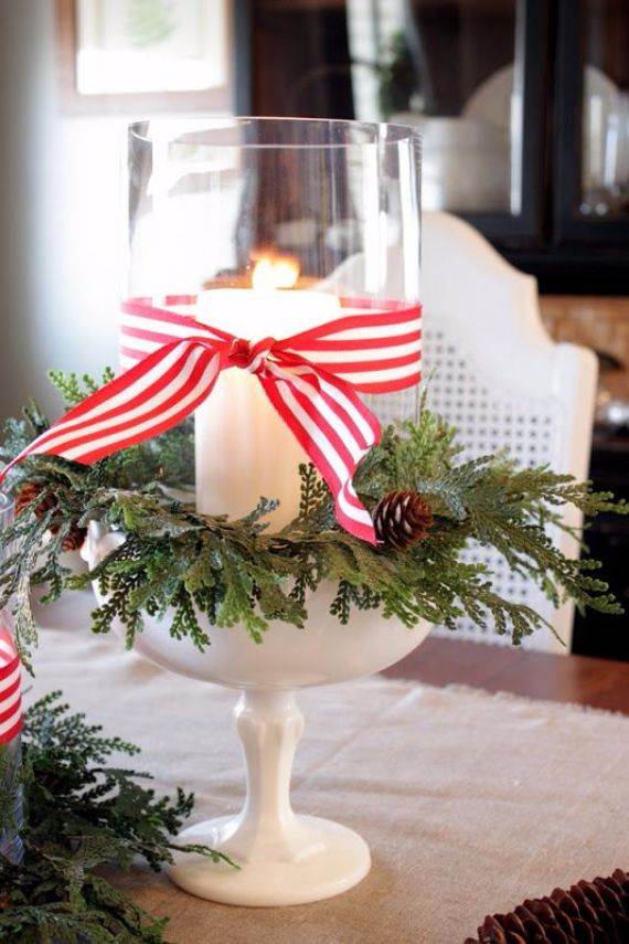 candle-jar-wrapped-with-faux-greenery-pinecones-and-striped-ribbon