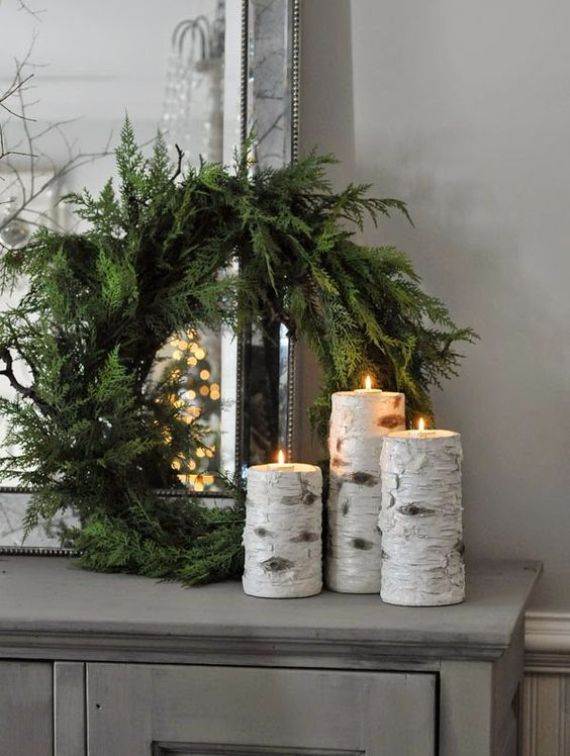 candles-wrapped-with-birch-bark-and-a-simpel-evergreen-wreath