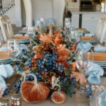 rust-velvet-pumpkins-berries-greenery-and-dried-fall-leaves-for-a-large-and-bold-fall-centerpiece