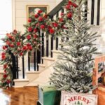Oversized-Green-Garland-with-Red-Ornaments-Staircase-via-@farmshenanigans