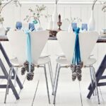 dining-room-cheap-Christmas-decor-pinecone-Blue-ribbons-White-chairs (1)