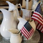 4th-of-July-Home-Decor-Flags-in-Farmhouse-White-Pitchers-via-@vintage_fication