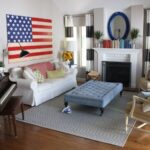 4th-of-July-Home-Decor-with-Wood-Flag-on-wall-above-Sofa-via-thegirlswithglasses