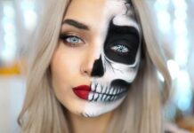 30 Best Scary Halloween Makeup Ideas–Creepy, Spooky and Horrifying Face Off Ideas Woman with long blonde hair wears Skeletal Half-Face paint, dramatic makeup, red lips, and intense eyes, creating a striking, mysterious contrast.