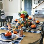 blue-and-white-plaid-placemats-blue-and-orange-pumpkins-blue-flwoers-and-striped-napkins-for-Thanksgiving