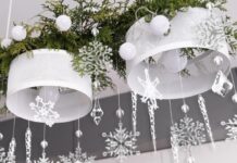 50 Elegant Christmas chandelier decoration ideas Christmas snowflake ornaments suspended from a chandelier frame