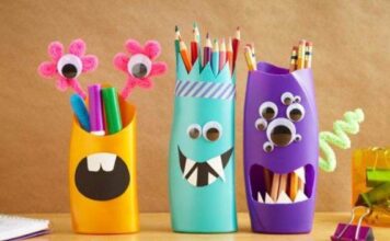 23 Creative and unusual DIY pencil holder ideas for your home desk decoration Colorful DIY monster pencil holders made from bottles. One is blue with zigzag teeth and a striped crown, the other purple with multiple googly eyes. Playful and creative.