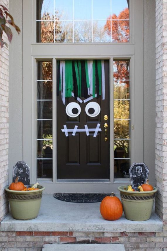 monster door decor with washi tape and googly eyes