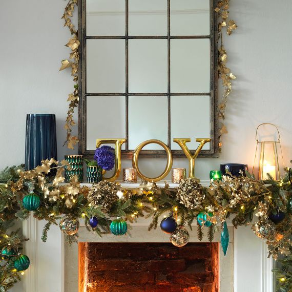 Christmas mantelpiece with festive message
