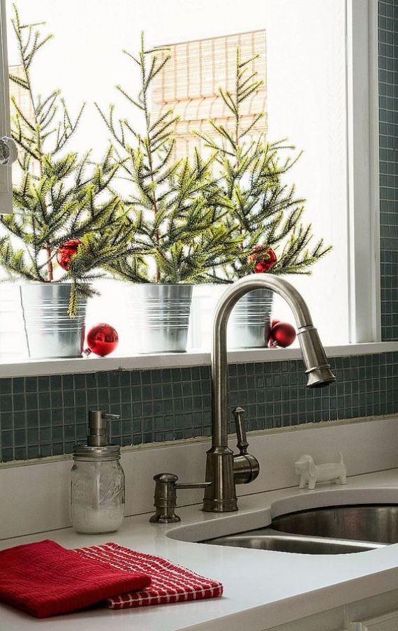 mini-Christmas-trees-in-buckets-with-red-ornaments-are-all-that-you-need-for-a-holiday-feel-in-the-space