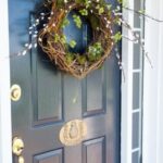 a-vine-wreath-with-moss-willow-and-a-fake-nest-with-colorful-eggs-will-be-a-nice-idea-for-sprign-or-Easter