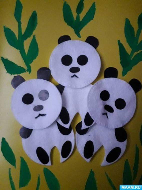 Three cute Cotton Pad Family Panda with round faces and black ears sit together on a yellow background with abstract green leaves, creating a playful scene.