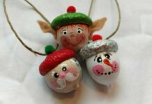 CRAFTS FROM NATURAL MATERIALS Three festive ornaments resembling an elf, snowman, and Santa. Each has painted faces with tiny hats, creating a cheerful, whimsical vibe.