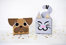 DIY holiday ANIMAL gift wrapping ideas Cute DIY animal gift wrapping boxes shaped like a pug and a cat. The pug is brown with floppy ears; the cat is gray with glittery ears and a curly tail. Playful tone.