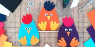 Adorable Easter Felt Craft Ideas for All Ages Three colorful felt chicken crafts—blue, orange, and purple—sit on a cutting mat with craft supplies around them, conveying a playful tone.